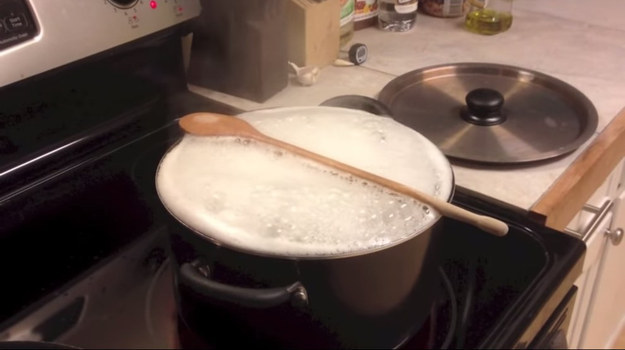 Balancing a wooden spoon across a pot of water keeps it from boiling over.